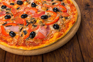 Delicious pizza with salami, mushrooms and olives