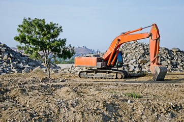 Excavator on the construction of a bridge in Kerch