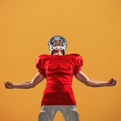 Aggressive american football player in red jersey