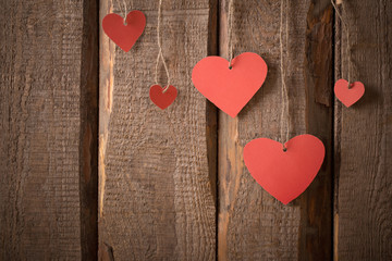 vintage red  hearts on wooden background