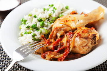 Chicken with rice and tomato sauce