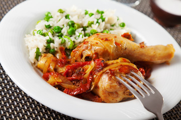 Chicken with rice and tomato sauce