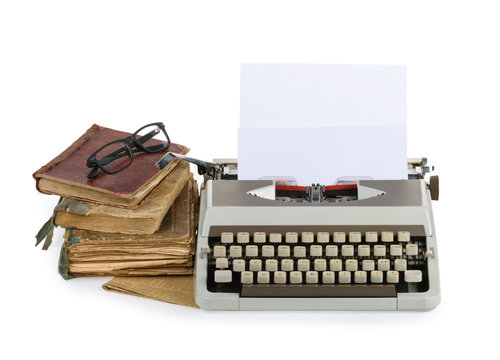  Typewriter with sheet of paper isolated on white background