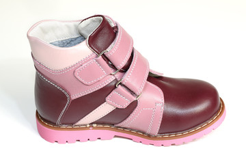 Fall shoes for little girl over white background