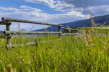 Old Wooden Farm Fence at Scenic Lake Shore