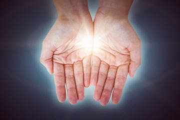 Composite image of hands showing