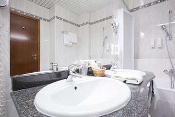 Spacious hotel bathroom interior