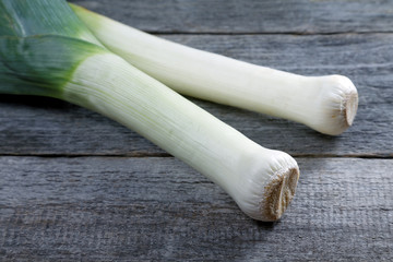 large shallot stalks on a rustic table