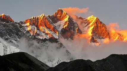 golden snow mountain sunset in the Himalayas - obrazy, fototapety, plakaty