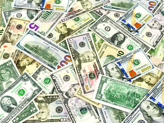 Business and financial concept. Heap of dollar bills abstract background  
