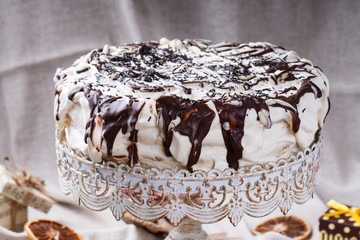 Cake in chocolate icing.Christmas and new year cakes,gift.selective focus