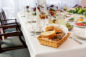 Table served in restaurant with tasty meals.