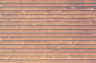 Brown natural wood wall texture and background seamless