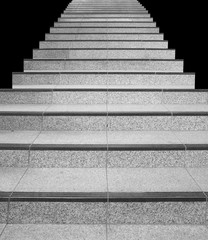 Fototapeta na wymiar Long stair concrete isolated on a black blackground