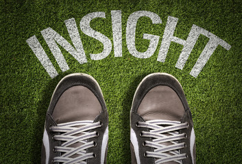 Top View of Sneakers on the grass with the text: Insight