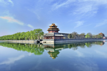 Fototapeta na wymiar World Heritage Site Beijing Forbidden City reflected in its canal.