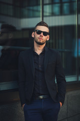 confident young successful man in a suit