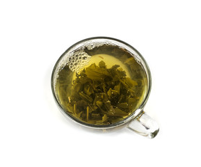 Glass cup of green tea isolated on white