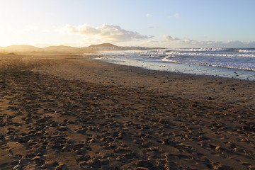 Famara beach at sunset