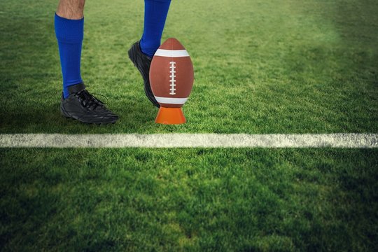 Composite image of american football player kicking ball