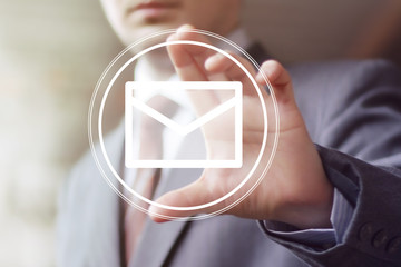 Businessman hand press web mail button sign
