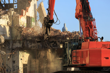 Dismanteling of an old factory on a sunny day.
