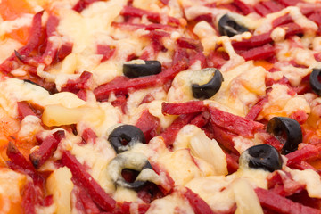 Pizza with cheese and ham closeup