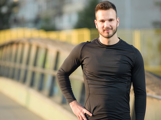 Portrait Of Male Runner On Urban Street