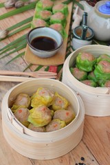 Chinese steamed dumpling and hot tea delicious.