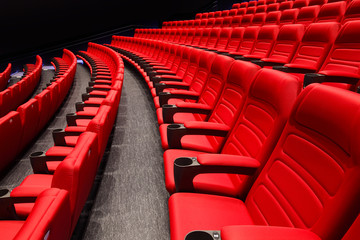 Empty rows of red theater or movie seats