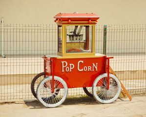 Popcorn machine made in vintage style, with sign Pop Corn