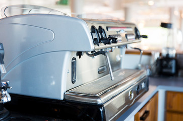 close up of coffee machine at bar or restaurant