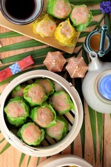 Chinese steamed dumpling and hot tea delicious.