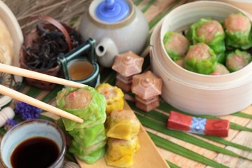 Chinese steamed dumpling and hot tea delicious.