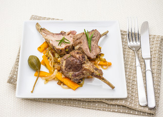 Grilled racks of lamb with carrot, capers