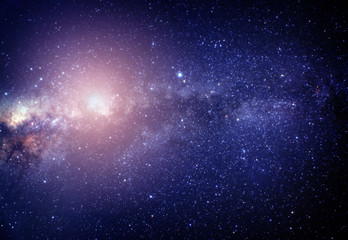 blurred image of pink stars in the galaxy. Some elements of this
