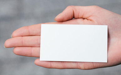 Fototapeta premium Hand holding a blank business or visit card