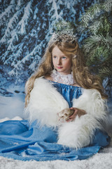 Snow Princess sits in the snow at Christmas trees 4573.
