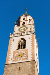 Bell Tower of the Cathedral of Merano - Italy / Detail of the bell tower of the Cathedral of St. Nicholas (1302-1465) in Merano, Bolzano, Trentino Alto Adige, Italy