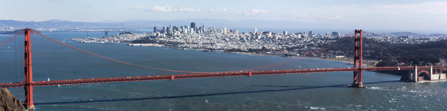 Golden Gate bridge seen from Marin County, with view of San Francisco across the bay on a clear winter's day.