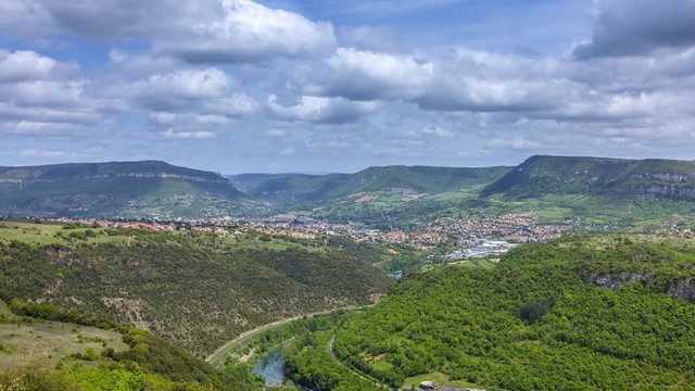 Timelapse of clouds passing over the valley of river Tarn in the vicinity of the Viaduct Millau in Midi Pyrenees, France.