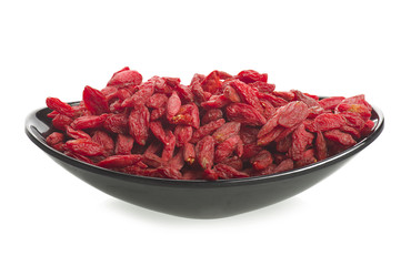 Bowl with Group of Goji berry on the white