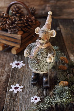 Christmas background: Mouse figurine on skis