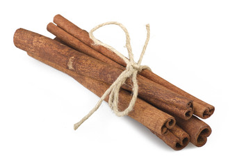 cinnamon stick spice close up on the white