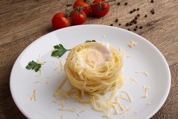 Fettuccini, egg, cheese and tomatoes