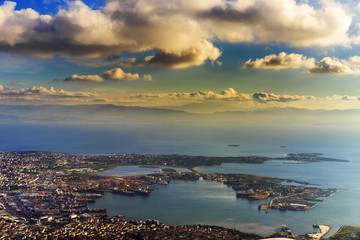 Istanbul, Turkey, photographed from above late November.  Costal line, a shipyard surrounded by residential buildings. Bosphorus view followed by a distant Asian Sea shore.