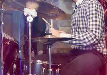 Fototapeta na wymiar playing the drum set