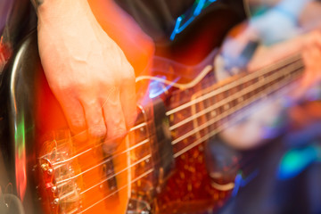 Obraz premium aggressive play guitar on stage