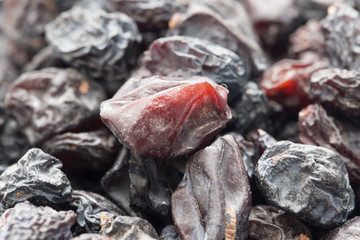 Black raisins as background. macro