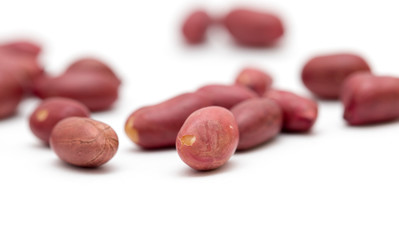 Peanuts on a white background. close